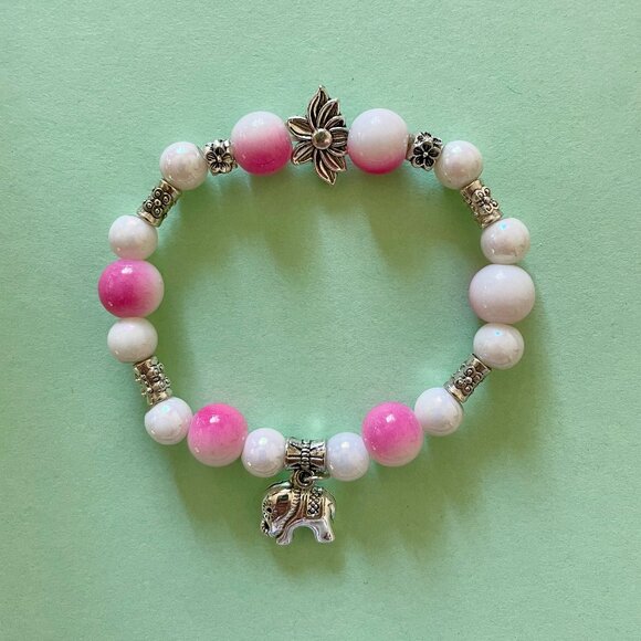 Handmade bracelet with beads and dangling elephant charm - Picture 1 of 7